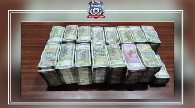 The cash seized by Bengaluru's CCB on Wednesday from three suspects. (@CCBBangalore/Twitter) The cash seized by Bengaluru's CCB on Wednesday from three suspects. (@CCBBangalore/Twitter)