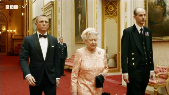 Queen Elizabeth II with Daniel Craig as James Bond. Queen Elizabeth II with Daniel Craig as James Bond.