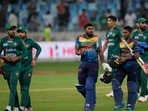 Sri Lankan batsmen Wanindu Hasaranga de Silva, third left, and Pathum Nissanka leave the field with Pakistan players(AP) Sri Lankan batsmen Wanindu Hasaranga de Silva, third left, and Pathum Nissanka leave the field with Pakistan players(AP)