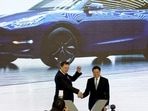 FILE PHOTO: Tesla Inc CEO Elon Musk and Shanghai's Mayor Ying Yong attend an opening ceremony for Tesla's China-made Model Y program in Shanghai, China January 7, 2020. REUTERS/Aly Song/File Photo