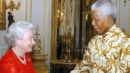 Queen Elizabeth II Passes Away: Britain's Queen Elizabeth II meets with former South African President Nelson Mandela.