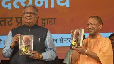 Uttar Pradesh chief minister Yogi Adityanath at the launch of a book on Prime Minister Narendra Modi, in Varanasi on Friday. (HT PHOTO)