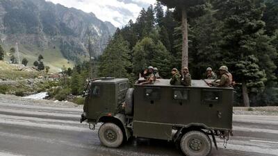 Indian army soldiers are seen atop a vehicle on a highway leading to Ladakh, at Gagangeer in Jammu & Kashmir’s Ganderbal district. (REUTERS) Indian army soldiers are seen atop a vehicle on a highway leading to Ladakh, at Gagangeer in Jammu & Kashmir’s Ganderbal district. (REUTERS)