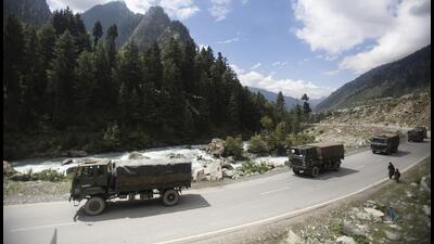An Indian army convoy moves on the Srinagar-Ladakh highway at Gagangeer, northeast of Srinagar, Jammu and Kashmir, on Sept 1, 2020. (AP) An Indian army convoy moves on the Srinagar-Ladakh highway at Gagangeer, northeast of Srinagar, Jammu and Kashmir, on Sept 1, 2020. (AP)