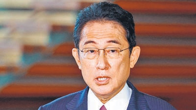 Japanese Prime Minister Fumio Kishida speaks to reporters about the death of Britain's Queen Elizabeth II at the prime misinter's office in Tokyo on September 9, 2022. - Queen Elizabeth II, the longest-serving monarch in British history and an icon instantly recognisable to billions of people around the world, died at her Scottish Highland retreat on September 8 at the age of 96. (Photo by JIJI Press / AFP) / Japan OUT (AFP) Japanese Prime Minister Fumio Kishida speaks to reporters about the death of Britain's Queen Elizabeth II at the prime misinter's office in Tokyo on September 9, 2022. - Queen Elizabeth II, the longest-serving monarch in British history and an icon instantly recognisable to billions of people around the world, died at her Scottish Highland retreat on September 8 at the age of 96. (Photo by JIJI Press / AFP) / Japan OUT (AFP)