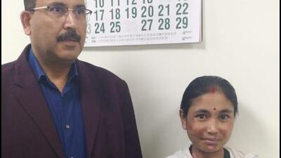 Dr Sasanka Kumar Barua of Guwahati Medical College Hospital with the patient following her recovery. (Sourced image) Dr Sasanka Kumar Barua of Guwahati Medical College Hospital with the patient following her recovery. (Sourced image)