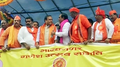 A man tried to confront Assam CM Himanta Biswa Sarma by dismantling the mike on a stage at a rally, in Hyderabad on Friday. (ANI Photo) A man tried to confront Assam CM Himanta Biswa Sarma by dismantling the mike on a stage at a rally, in Hyderabad on Friday. (ANI Photo)