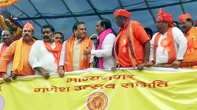 A man tried to confront Assam CM Himanta Biswa Sarma by dismantling the mike on a stage at a rally, in Hyderabad on Friday. (ANI Photo) A man tried to confront Assam CM Himanta Biswa Sarma by dismantling the mike on a stage at a rally, in Hyderabad on Friday. (ANI Photo)