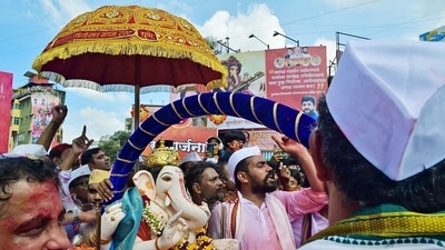 Pune also witnessed colourful celebrations as devotees bid adieu to Ganapati. (Nitin Lawate) Pune also witnessed colourful celebrations as devotees bid adieu to Ganapati. (Nitin Lawate)