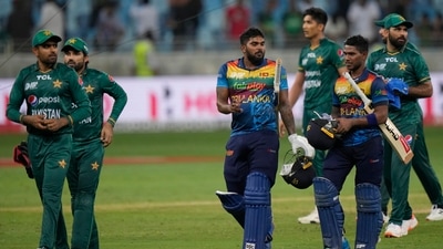 Sri Lankan batsmen Wanindu Hasaranga de Silva, third left, and Pathum Nissanka leave the field with Pakistan players (AP) Sri Lankan batsmen Wanindu Hasaranga de Silva, third left, and Pathum Nissanka leave the field with Pakistan players (AP)
