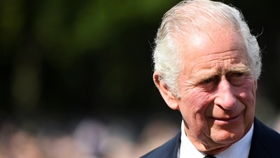 King Charles III First Address: Britain's King Charles looks on outside Buckingham Palace. (Reuters)
