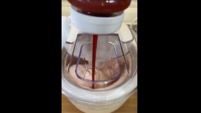 The image, taken from the viral instagram video, shows the man making ketchup ice cream. (Insatgram/@kyleistook)