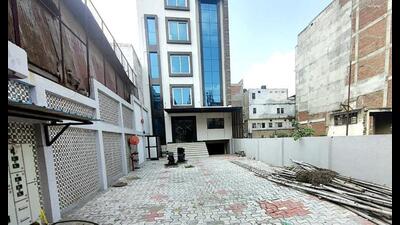 Lucknow Development Authority seals SSJ International Hotel, a commercial structure built on residential land, in Lucknow on Friday. (ANI Photo)