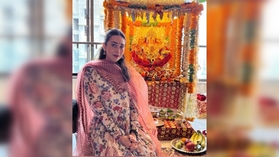 For the occasion, Karisma Kapoor wore a floral printed anarkali set teamed with a striped dupatta. (Instagram/@therealkarismakapoor) For the occasion, Karisma Kapoor wore a floral printed anarkali set teamed with a striped dupatta. (Instagram/@therealkarismakapoor)