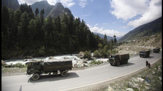 An Indian army convoy moves on the Srinagar-Ladakh highway at Gagangeer, northeast of Srinagar, Jammu and Kashmir, on Sept 1, 2020. (AP)