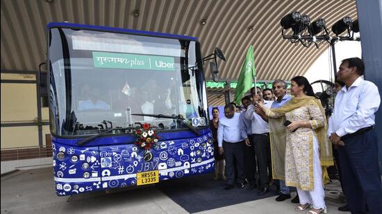 Four air-conditioned buses will ply two routes, with minimal stops, officials said, adding that commuters can book seats for the service (called Gurugaman Plus) from the Uber app itself. (Vipin Kumar/HT Photo) Four air-conditioned buses will ply two routes, with minimal stops, officials said, adding that commuters can book seats for the service (called Gurugaman Plus) from the Uber app itself. (Vipin Kumar/HT Photo)