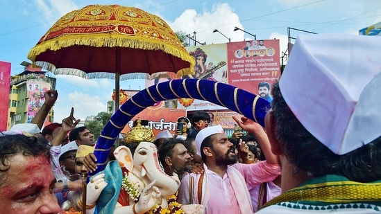 Pune also witnessed colourful celebrations as devotees bid adieu to Ganapati.(Nitin Lawate)