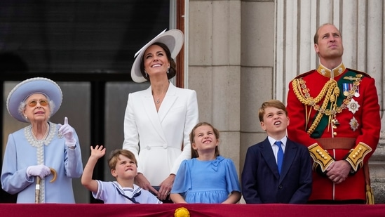 ,Queen Elizabeth II, from left, Prince Louis, Kate, Duchess of Cambridge, Princess Charlotte, Prince George and Prince William.(AP)