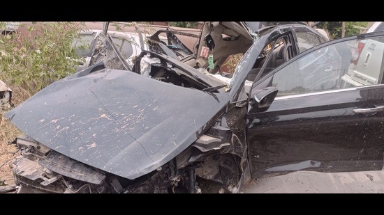 The mangled remains of the car that fell off the Ladhowal flyover in Ludhiana on Friday. (HT Photo)