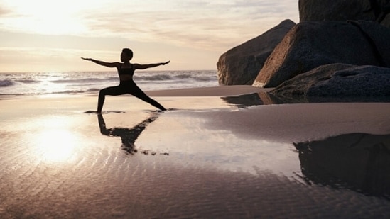 Physical activities, such as yoga, running, walking or any other form of exercises helps in energising the body and making it look younger and fresher.(Unsplash)