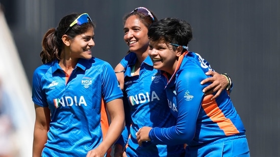 India's captain Harmanpreet Kaur, center, with teammates Radha Yadav, left, and Shafali Verma.(AP)