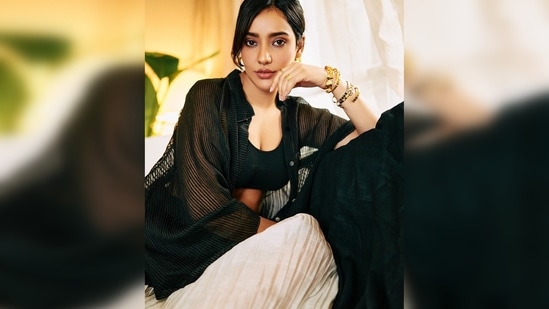 Sharing another two more images, Neha Sharma wrote, " Black is everything..."(Instagram/@nehasharmaofficial)