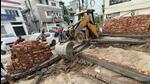 The MC team demolishing illegal under-construction shops in the residential area of Kundanpuri in Ludhiana. (HT PHOTO)