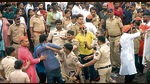 Police personnel discipline the crowd at Tilak chowk on Friday. (HT PHOTO) Police personnel discipline the crowd at Tilak chowk on Friday. (HT PHOTO)