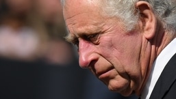 King Charles III: Britain's King Charles III reacts as he greets the members of the public in the crowd upon arrival at Buckingham Palace in London.