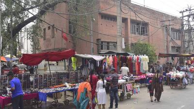 Street vendors encroachments on road portion outside the Pink Plaza Market at Chhaura Baazar in Ludhiana. One of the MC officials, requesting anonymity, said earlier, a few shopkeepers also used to charge rent from vendors for installing vends outside the market. Due to some tussle between both the parties over payment of rent, shopkeepers now want vends to be removed from the market, the official said (Gurpreet Singh/HT) Street vendors encroachments on road portion outside the Pink Plaza Market at Chhaura Baazar in Ludhiana. One of the MC officials, requesting anonymity, said earlier, a few shopkeepers also used to charge rent from vendors for installing vends outside the market. Due to some tussle between both the parties over payment of rent, shopkeepers now want vends to be removed from the market, the official said (Gurpreet Singh/HT)