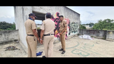A police team at the spot where the minor’s body was found on the terrace of a MIDC building in Pune, on Saturday. (HT PHOTO) A police team at the spot where the minor’s body was found on the terrace of a MIDC building in Pune, on Saturday. (HT PHOTO)