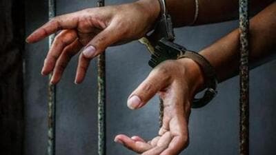 Prisoner in prison with handcuff (Getty Images/iStockphoto)