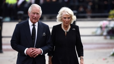 Charles And Camilla's Marriage: Britain's King Charles and Queen Camilla walk outside Buckingham Palace. (Reuters)