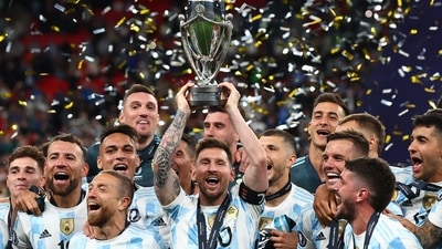 Argentina's Lionel Messi celebrates with the trophy and teammates after winning the Finalissima (REUTERS)