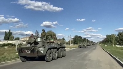 A still image from video, released by the Russian Defence Ministry, shows what it said to be a Russian military convoy heading towards the frontline in Ukraine's Kharkiv region (via REUTERS)