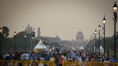 The ‘Kartavya Path’ has been lined with lush lawns, 16.5km of red granite walkways, refurbished canals, repaired and polished facades, public amenities, special vending zones, and improved signages. (Sanchit Khanna/Hindustan Times)