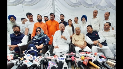 National Conference (JKNC) chief Farooq Abdullah addresses a press conference as PDP chief Mehbooba Mufti and others look on in Jammu on Saturday. (ANI) National Conference (JKNC) chief Farooq Abdullah addresses a press conference as PDP chief Mehbooba Mufti and others look on in Jammu on Saturday. (ANI)