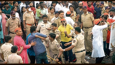 Police personnel discipline the crowd at Tilak chowk on Friday. (HT PHOTO)