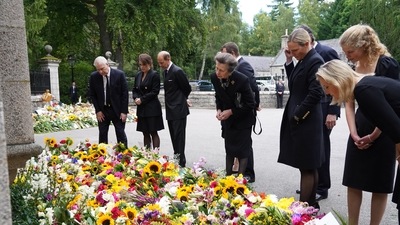 Queen's family members check the floral tributes at Balmoral (Twitter/@RoyalFamily) Queen's family members check the floral tributes at Balmoral (Twitter/@RoyalFamily)