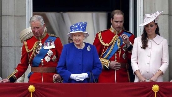 Queen Elizabeth II, on the balcony of Buckingham Palace with Britain's new monarch – Charles III (left), Prince William and Kate (right), to watch the Royal Air Force fly, part of the Trooping The Colour parade, in London. AP