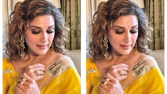 Sonali's six yards is from the shelves of Gulabo by designers Abu Jani and Sandeep Khosla. The star exuded sunshine and festive joy in the mustard gota saree paired with an elegant churidar sleeve blouse.(Instagram)