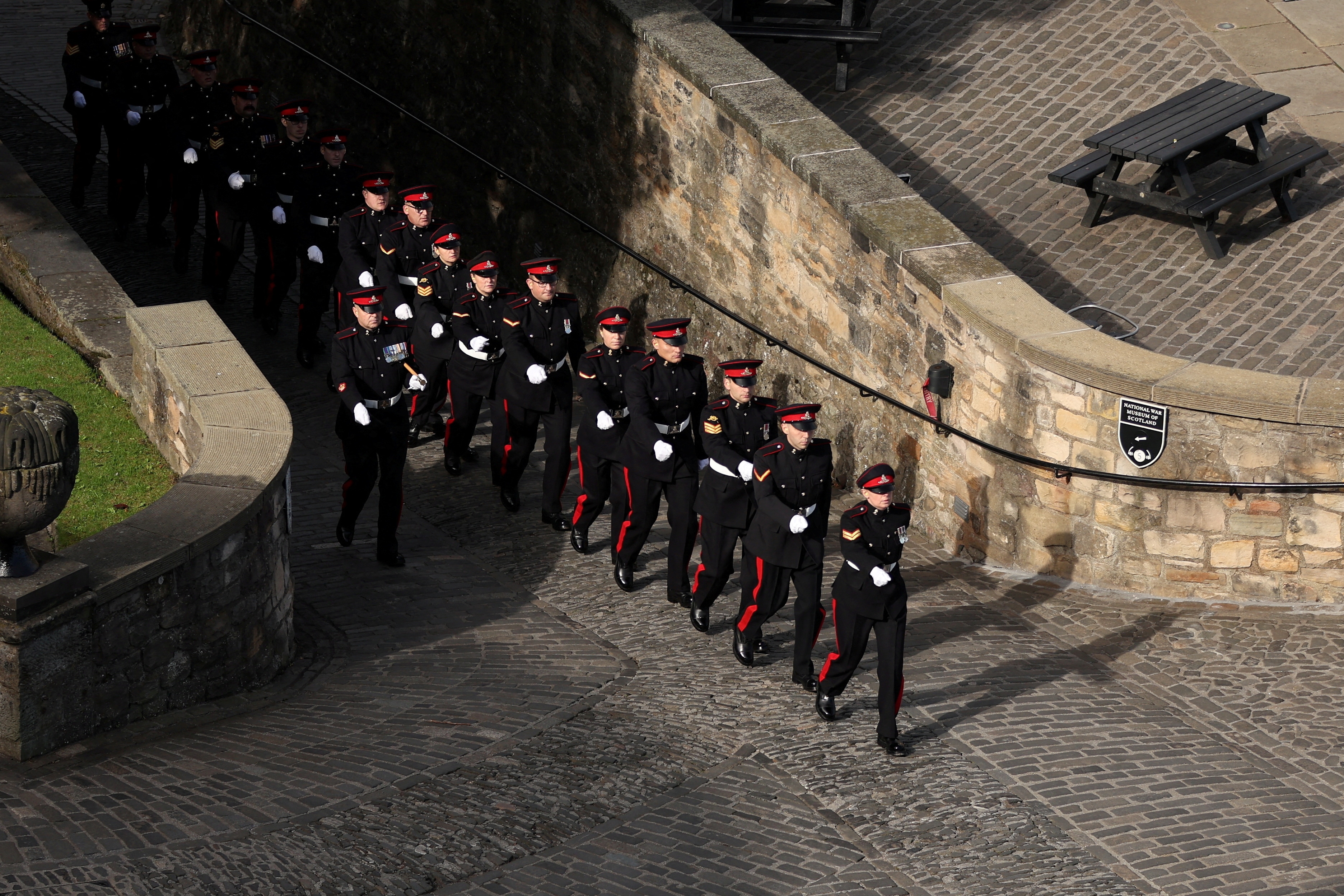 King Charles III Accession: Soldiers march to participate in a gun salute for Britain's King Charles. (Reuters)