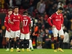 Manchester United's Cristiano Ronaldo and team mates stand dejected at full time after defeat during group E Europa League vs Real Sociedad at Old Trafford in Manchester. Manchester United's Cristiano Ronaldo and team mates stand dejected at full time after defeat during group E Europa League vs Real Sociedad at Old Trafford in Manchester.