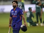 India's Rishabh Pant reacts as he walks off the field after losing his wicket(AP) India's Rishabh Pant reacts as he walks off the field after losing his wicket(AP)