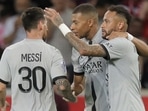 Lionel Messi, Kylian Mbappe, and Neymar react after scoring a goal during the French League One match&nbsp;