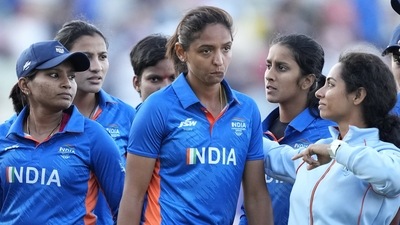 India's captain Harmanpreet Kaur, center, reacts after Team India's loss in a women's cricket match (AP) India's captain Harmanpreet Kaur, center, reacts after Team India's loss in a women's cricket match (AP)