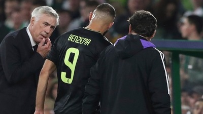 Real Madrid's head coach Carlo Ancelotti, centre left, reacts as Karim Benzema walks off after being substituted (AP) Real Madrid's head coach Carlo Ancelotti, centre left, reacts as Karim Benzema walks off after being substituted (AP)