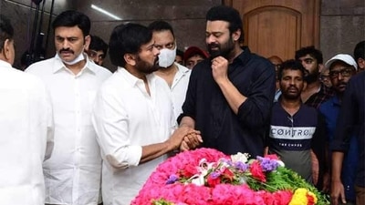 Chiranjeevi consoles a teary-eyed Prabhas after Krishnam Raju's death. Chiranjeevi consoles a teary-eyed Prabhas after Krishnam Raju's death.