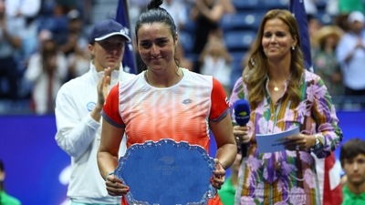 Tunisia's Ons Jabeur with the finalist trophy after finishing second in the U.S. Open. (REUTERS)