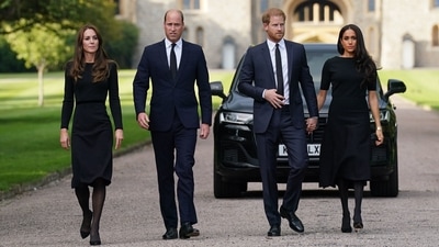 The four got photographed while coming out of Windsor Castle and viewing a massive sea of floral tributes laid outside in honour of the late monarch. (AFP)